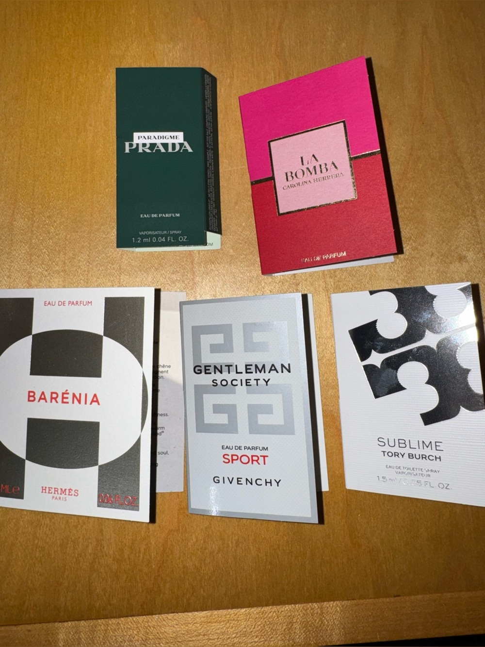 5 Assorted fragrances Tory Burch Prada La Bomba Barenia Gentlemen Society